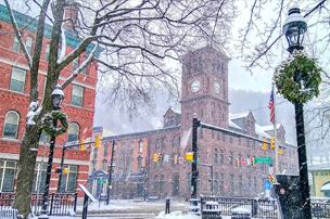 fyf_dtnjimthorpe_w Shot of clocktower in downtown Jim Thorpe on snowy day.