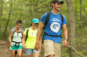 Three people hiking in the spring in Carbon County PA