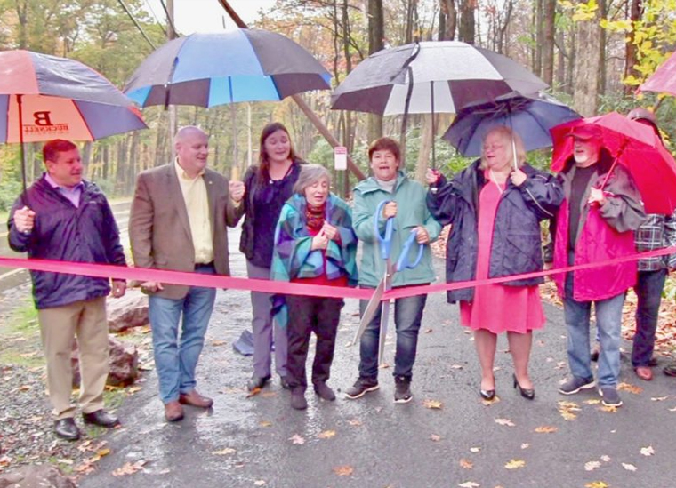 Men and women attending the Kidder Hike & Bike Trail Ribbon Cutting in Lake Harmony PA