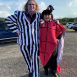 Man and woman dressed as Beetlejuice characters