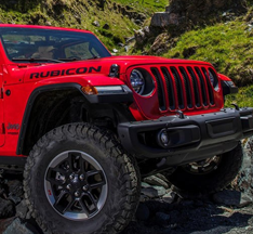Red rubicon jeep- JeepFest by Colossal Radio