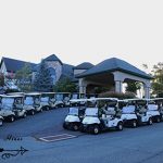 Golf carts in front of Split Rock Golf Club building