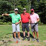 Three male golfers