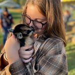 oktoberfest 22 girl holding baby goat