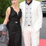 Glittersby Murder couple in black and white walking red carpet