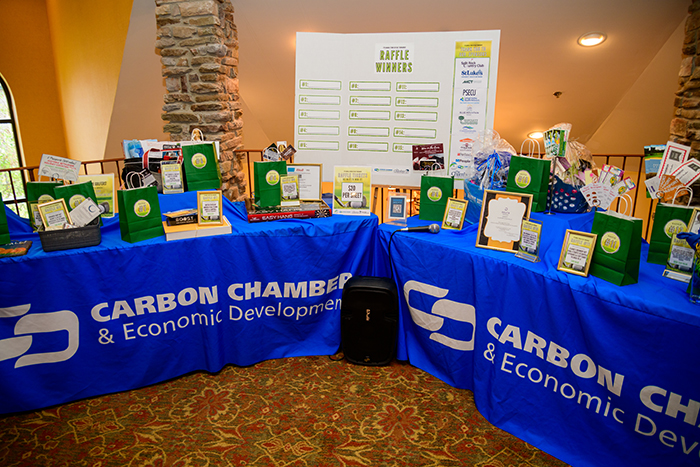 Carbon Chamber banquet tables with prize donations for golf outing