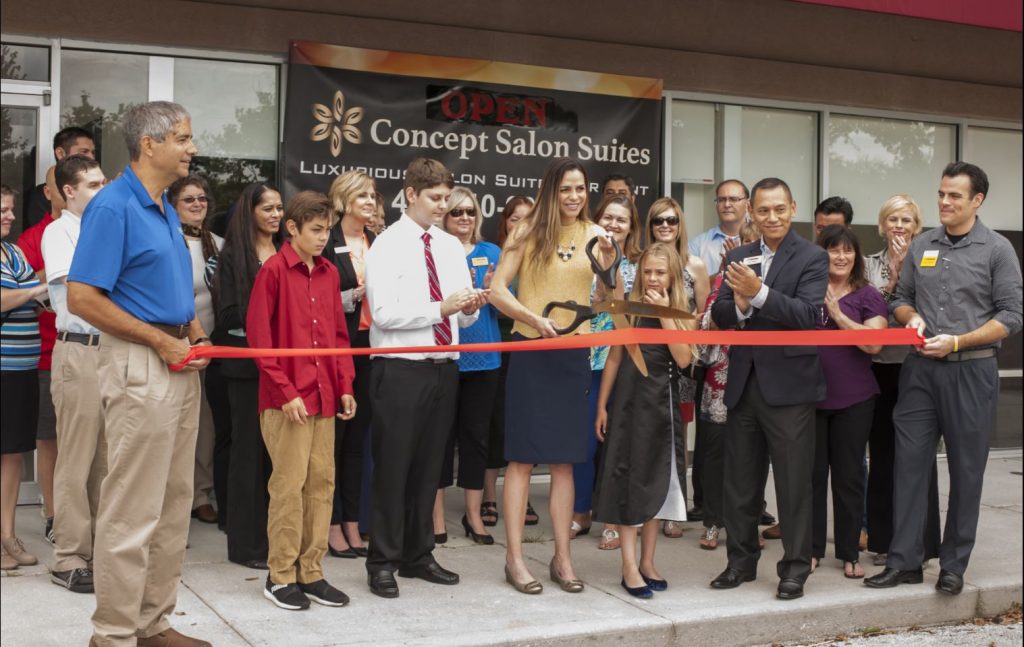 Concept-Salon-Suites group of people at ribbon cutting outside