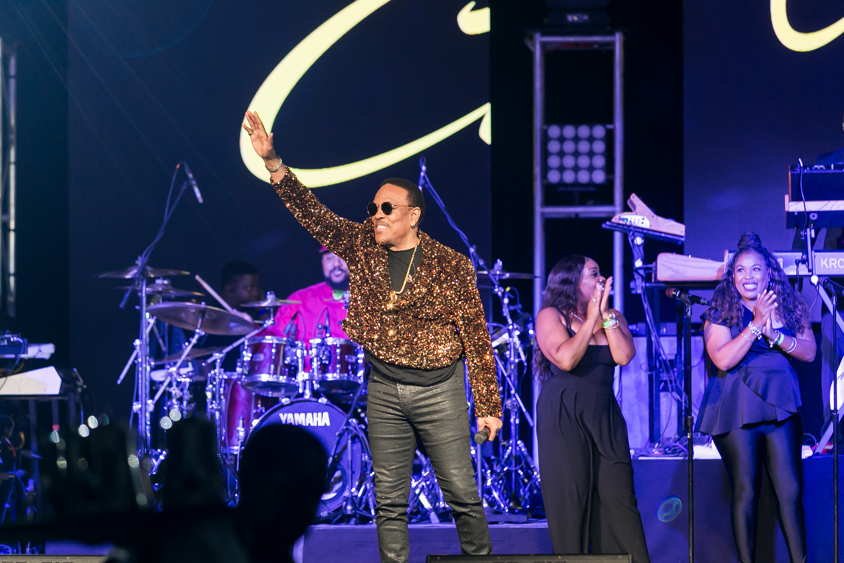 https://growthzonesitesprod.azureedge.net/wp-content/uploads/sites/1073/2023/02/Charlie-Wilson-Performing-at-Vision-and-Action.jpg