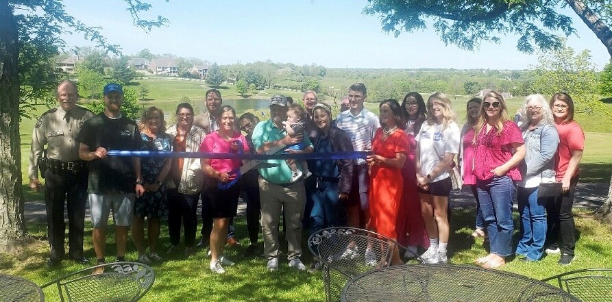 Julie Staton cuts the ribbon celebrating The View at Southwind membership into the Winchester-Clark County Chamber of Commerce.