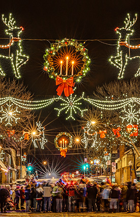 christmas lights at night on street downtown