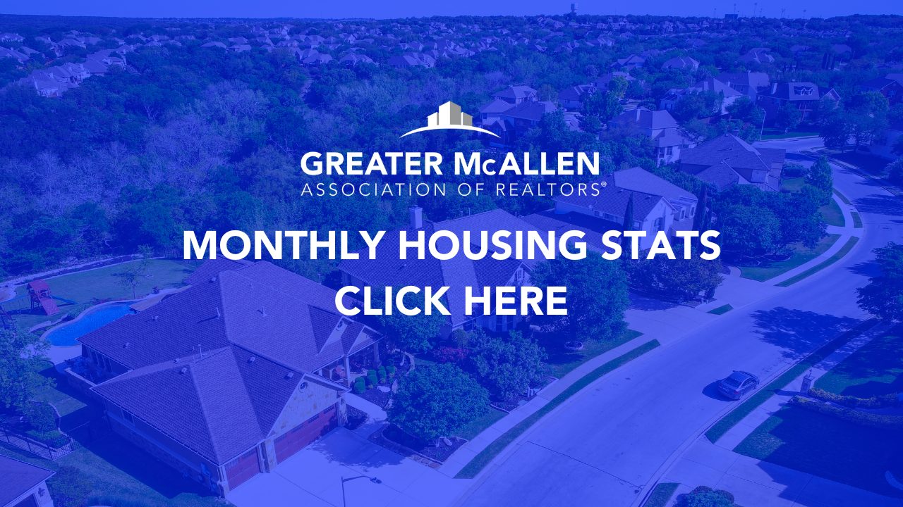 Photo of Homes with a Horizon in the background. Aerial angle. Overlayed with a transparent blue color. Caption reads: Monthly Housing Stats Click Here with GMAR Logo.