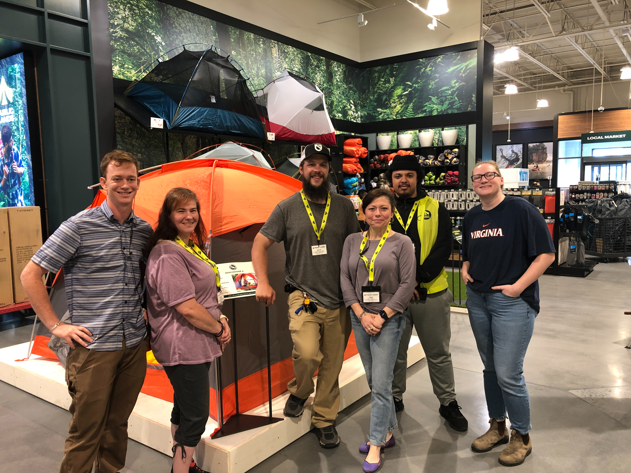 Coleman, Peggy, Jaret, Meg, Omri and Monica show off the tent area