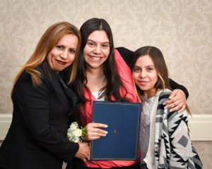Jazmin Santiesteban (center) with mother, Maria and sister, Iris