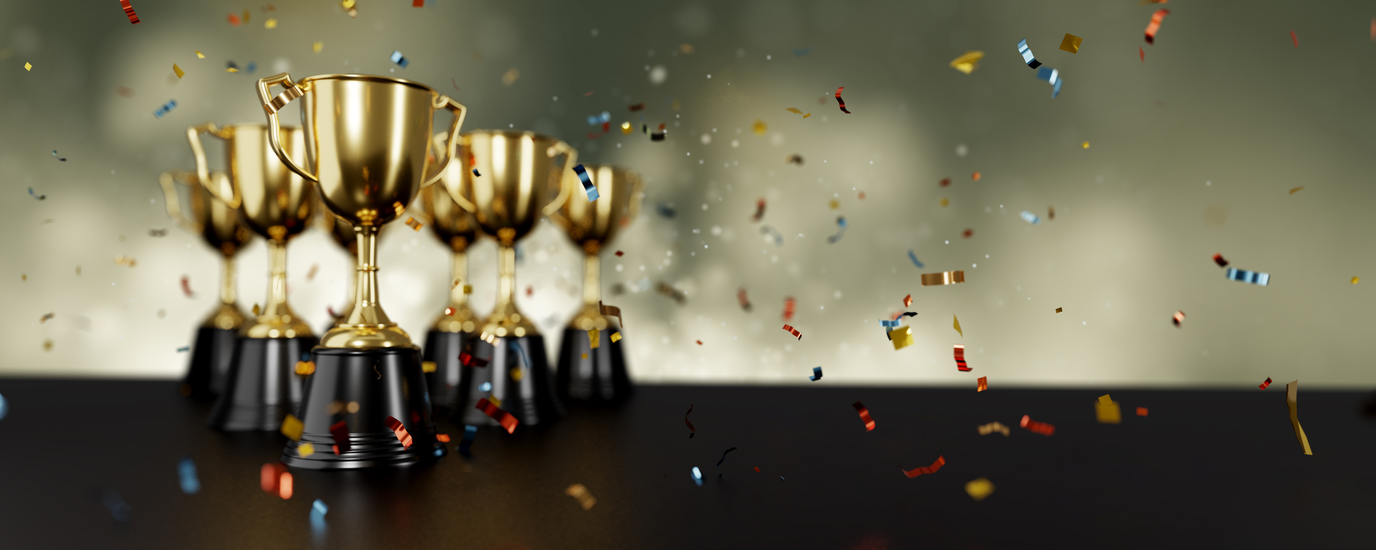 golden trophy award with falling confetti on gold background. co