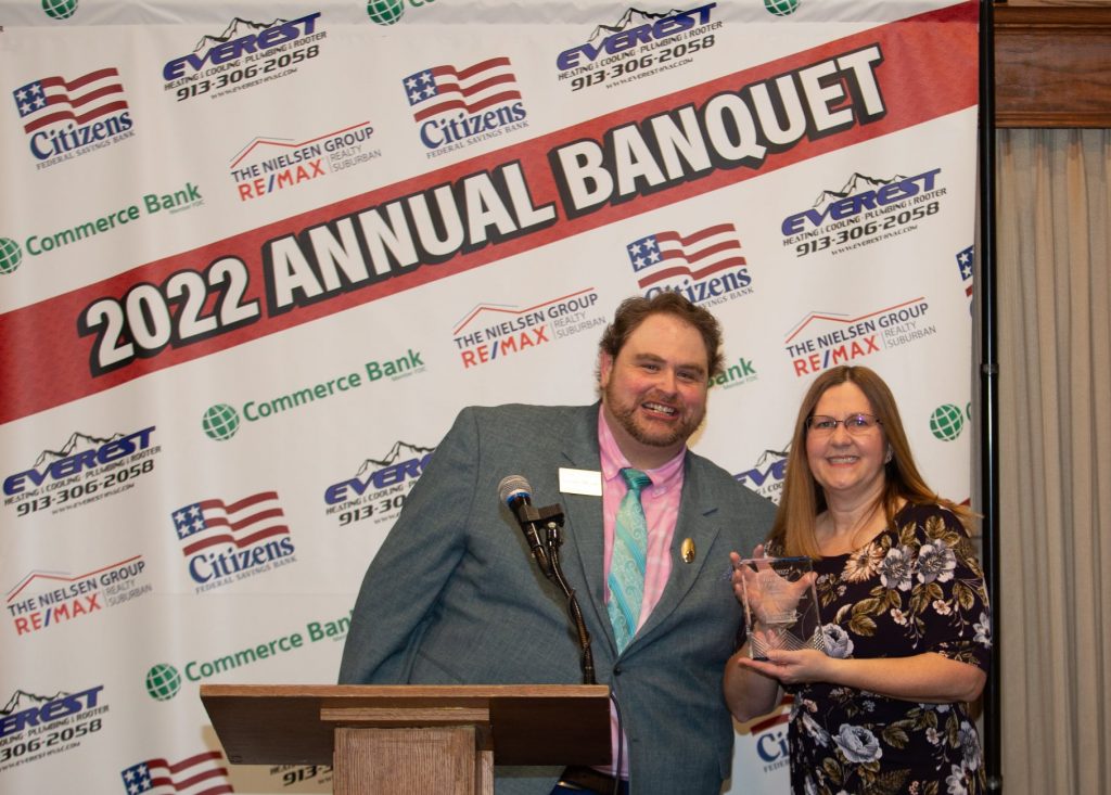 Brandon Johannes presenting the Business of the Year Award to Lisa Blanck representing Citizen's Federal Savings Bank.