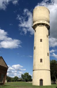 132 foot concrete water tower against blue sky