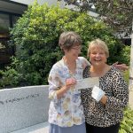 Laura Gingrass from Monadnock Community Hospital hands over a GKPC check to Ellen Avery from the Volunteer Transportation Company, who MCH chose to receive 50% of their charity golf sponsorship!