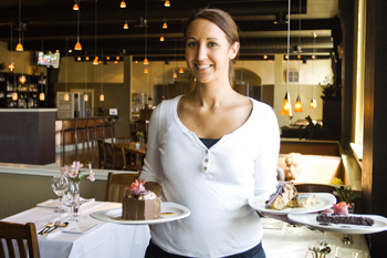 Woman serving desserts in a restaurant