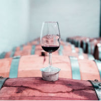 wine-glass-on-top-of-barrel-200 winery