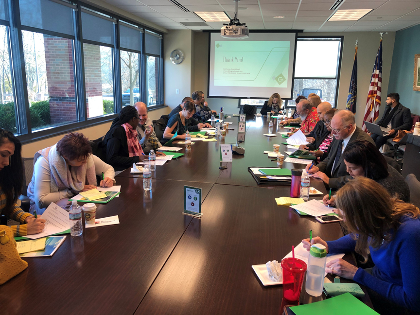 Pocono Chamber Committee meeting around conference table.