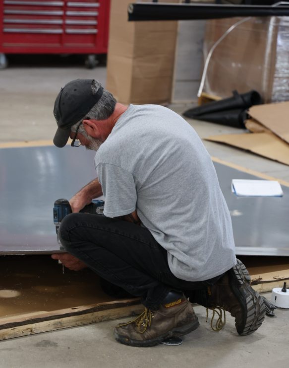 Wratten's Employee Providing Repair Services.