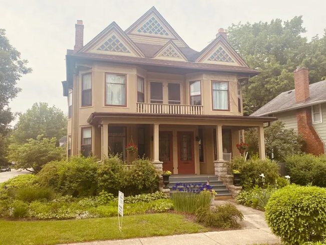two story brown house. Victorian style
