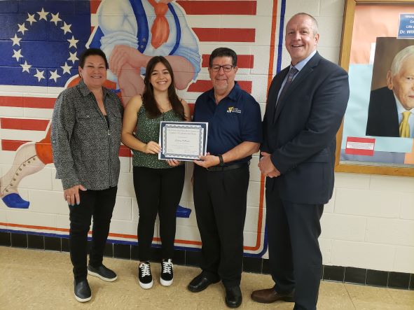 2022 | On June 2nd the New Hyde Park Chamber of Commerce Benevolence Fund $500 student award was presented to Sabrina DePaulis from Great Neck South High School. With a 93.4 grade average,  Sabrina excelled in her academics and extracurricular activities.   pictured below L -R  Cheryl Fajardo, Chamber President, Sabrina DePaulis, Richard DeMartino,  Chamber Past President,  Dr. Christopher Gitz, Principal.