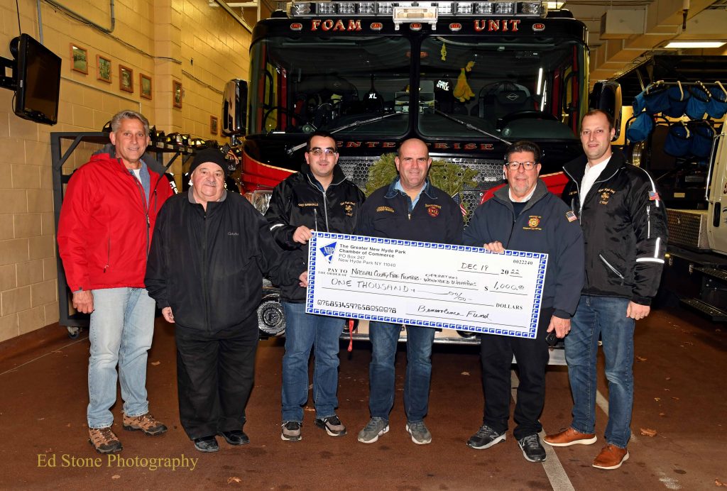 Nassau County Firefighters Wounded Warriors Fund
 
On December 19th members of the New Hyde Park Chamber of Commerce Benevolence Fund made a donation of $1,000 in support of the Nassau County Firefighters Wounded Warriors Fund.

This is an annual fund raiser to support the Veterans at the Walter Reed National Military Medical Center in Bethesda Maryland.

The Firefighters make several trips to Maryland with clothing and supplies for the Veterans in support of their recovery.