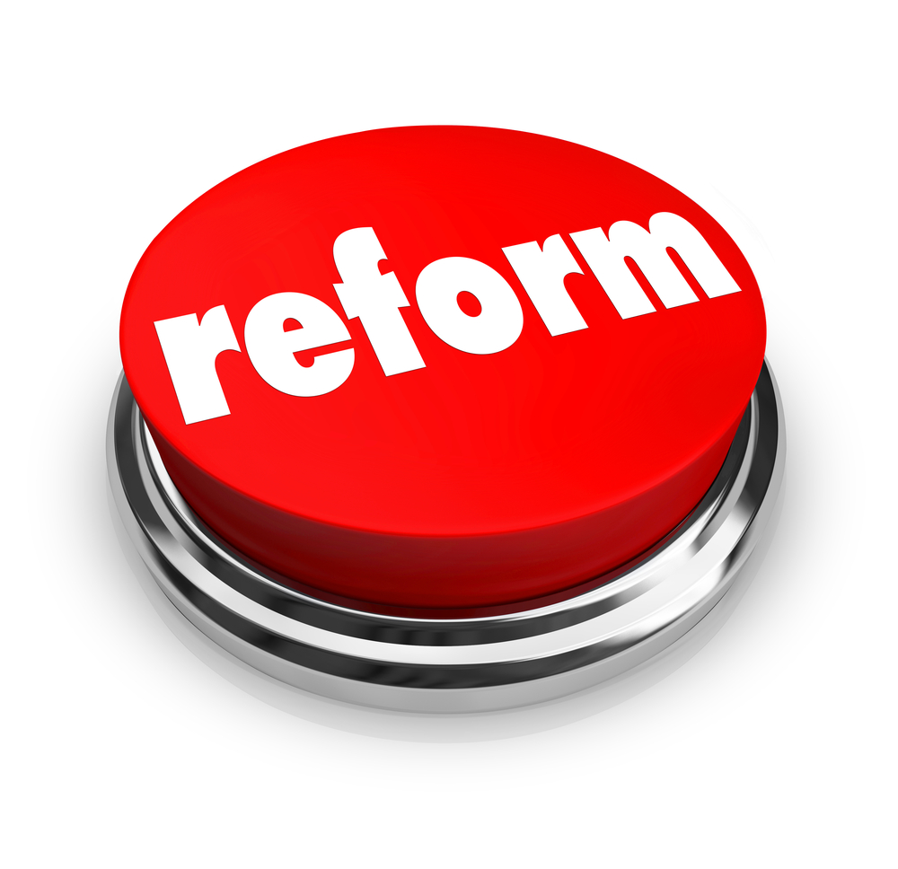 A red button with the word Reform on it