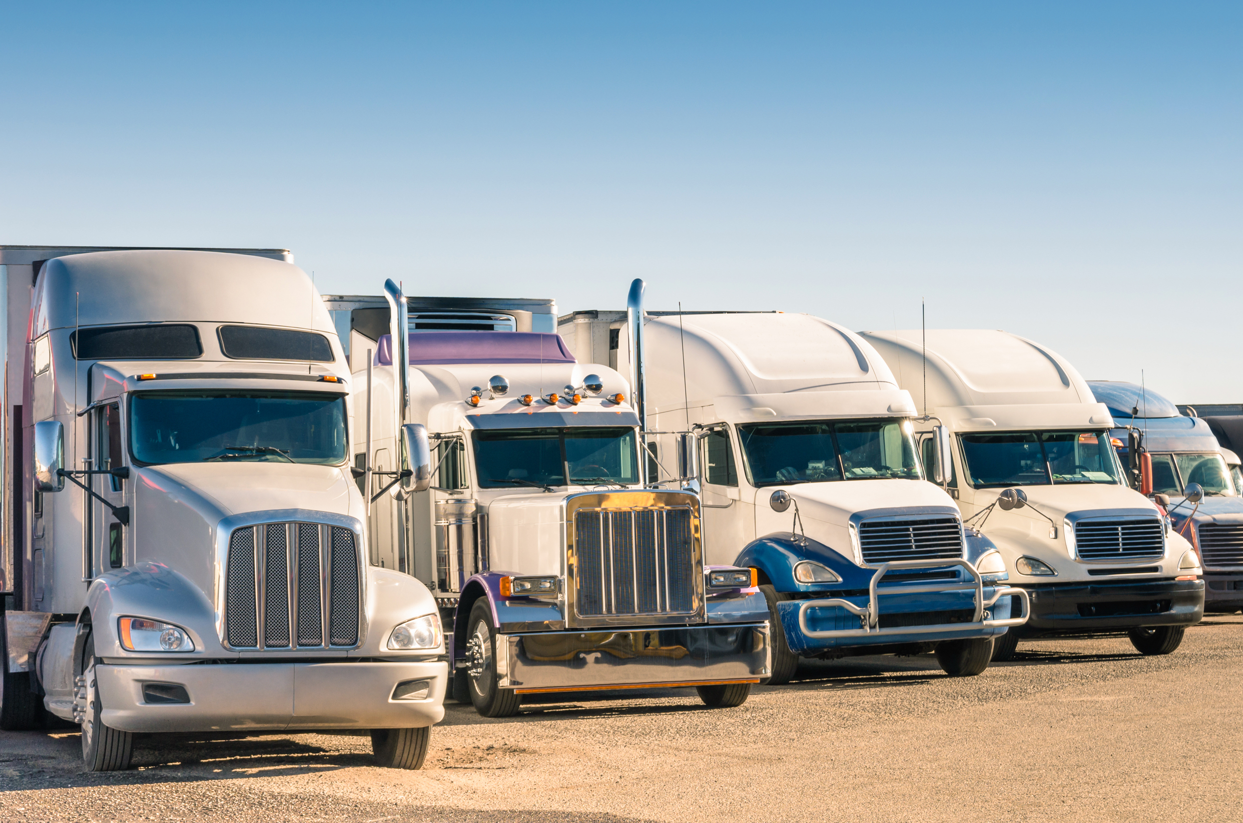 Generic,Semi,Trucks,At,A,Parking,Lot