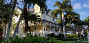 AC Freeman House Yellow Victorian two story in Historic Downtown Punta Gorda