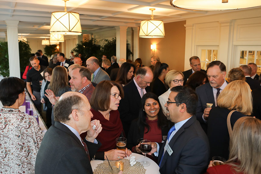 Over 140 attendees enjoy the networking cocktail hour at the 2019 EMCCC Annual Banquet.