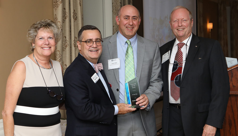 Dr. Stuart Tollen, Jenkintown Chiropractic Center proudly accepts EMCCC Community Service Award at Awards Celebration