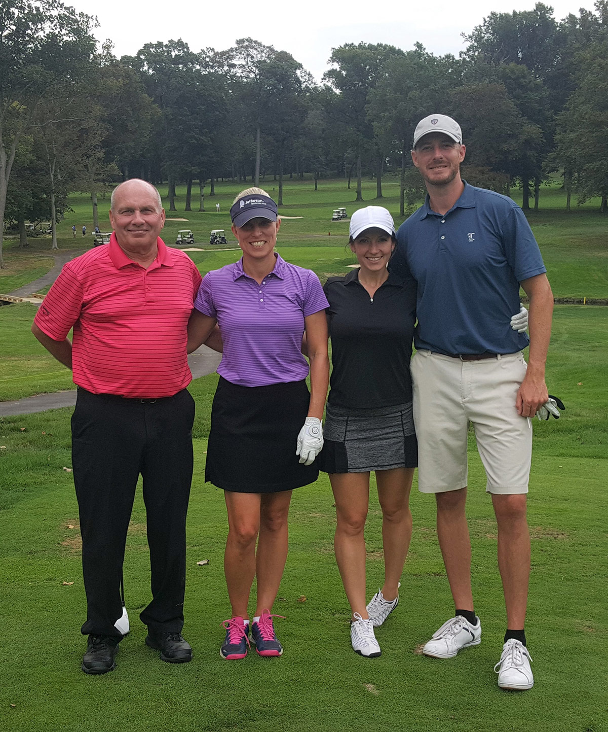 The Abington/Jefferson golf foursome enjoys a day on the course at the EMCCC golf outing.