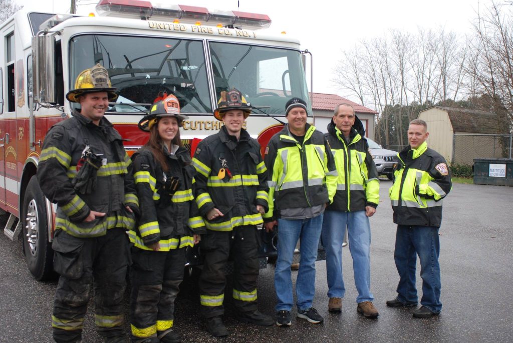 Event8 group of firefighters standing in front of fire truck