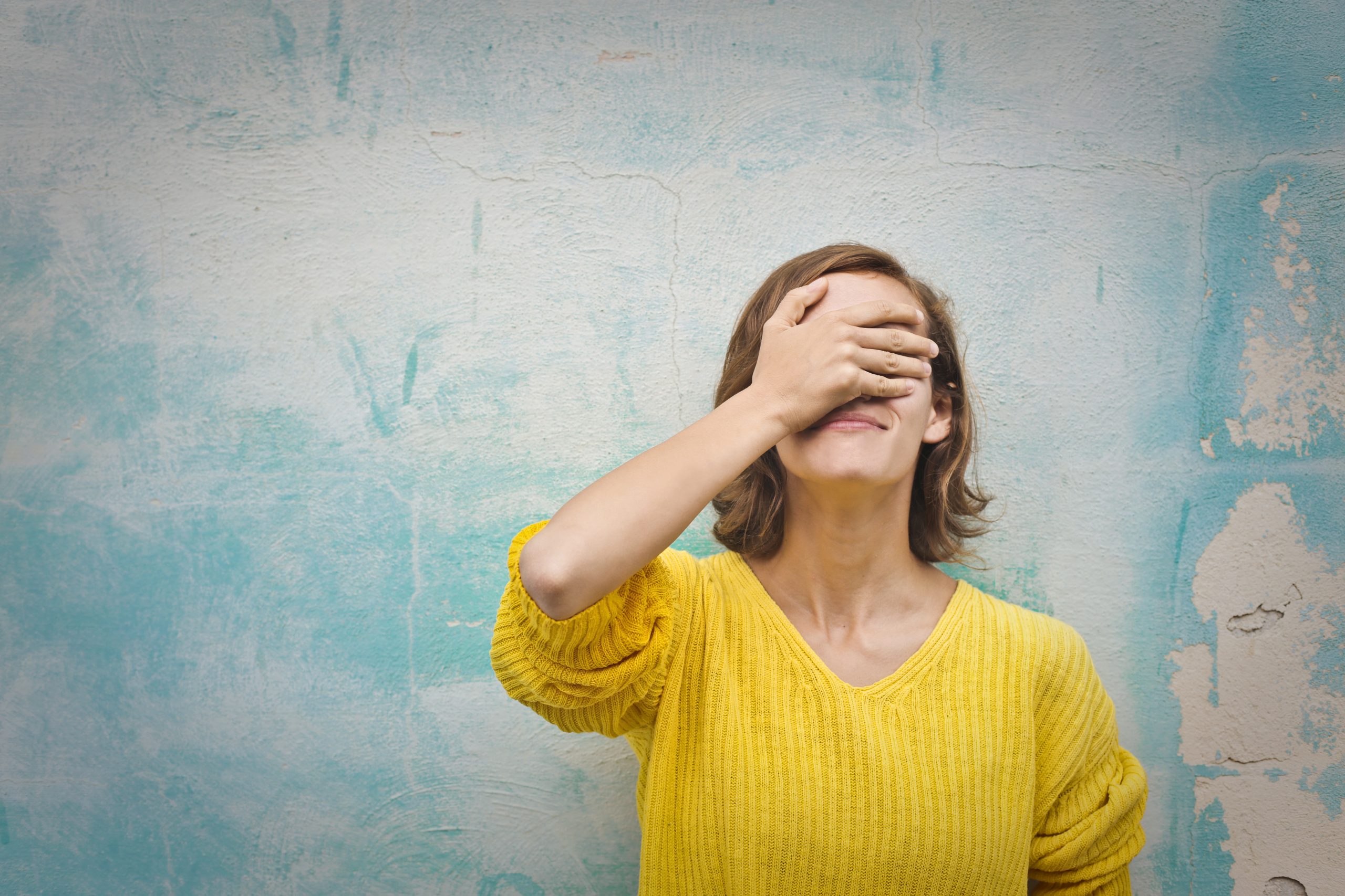 Young woman regretting a choice she has made