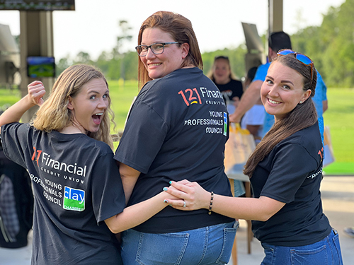 Young Professionals leadership show off their kick off tshirt