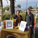 Photo of staff at front table for Galt Farmers Market