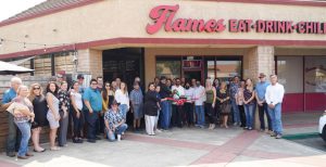 Photo of Flames owners, staff, & attendees of their Grand Opening & Ribbon Cutting on September 2, 2020