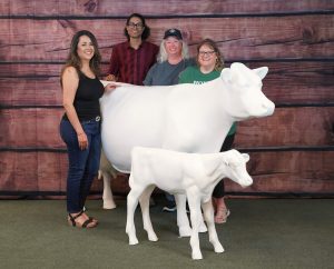 The Galt Herald group photo with cow at Adoption Day, April 30, 2022
