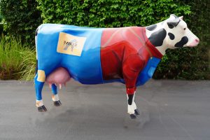 Parker Realty - finished cow - herd on the street
