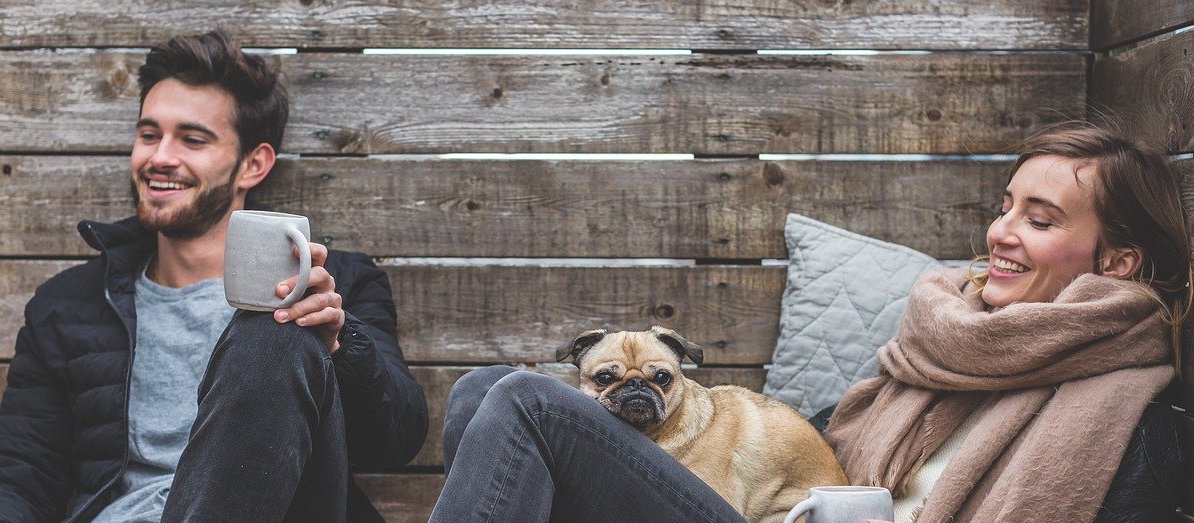 couple and a dog visiting paso robles