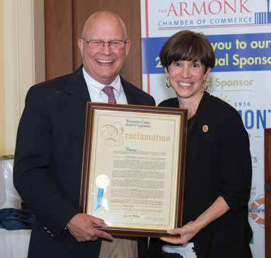 Last Year’s Citizen of the Year, Ed Woodyard, accepting his Proclamation from County Legislator Margaret Cunzio