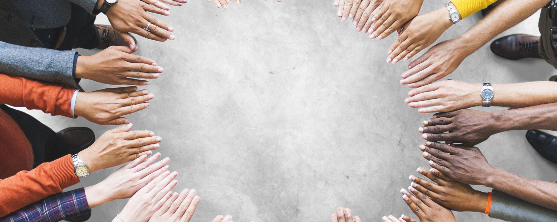 group of hands in circle