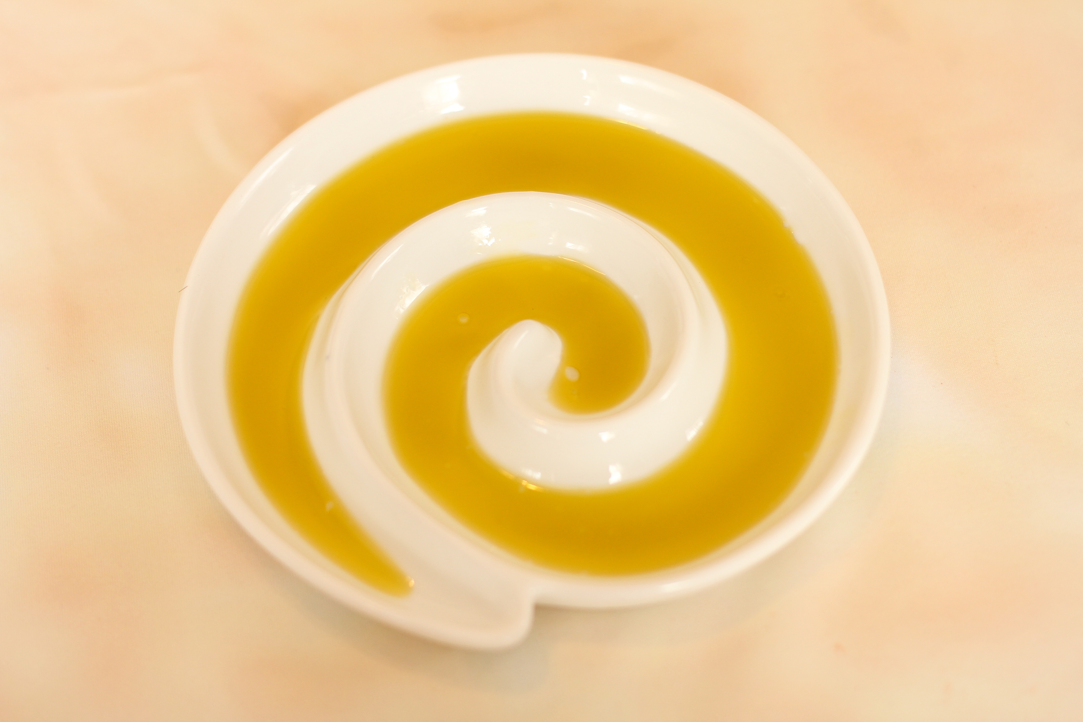 oil in swirl dish