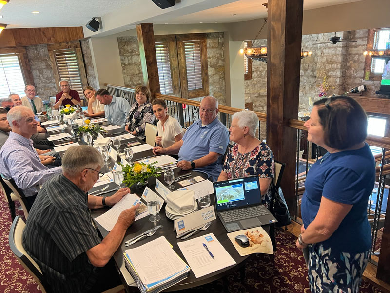 Visit Shawnee hosts its Advisory Committee meeting at Wandering Vine and is greeted by owner-operator Carla Dyer.