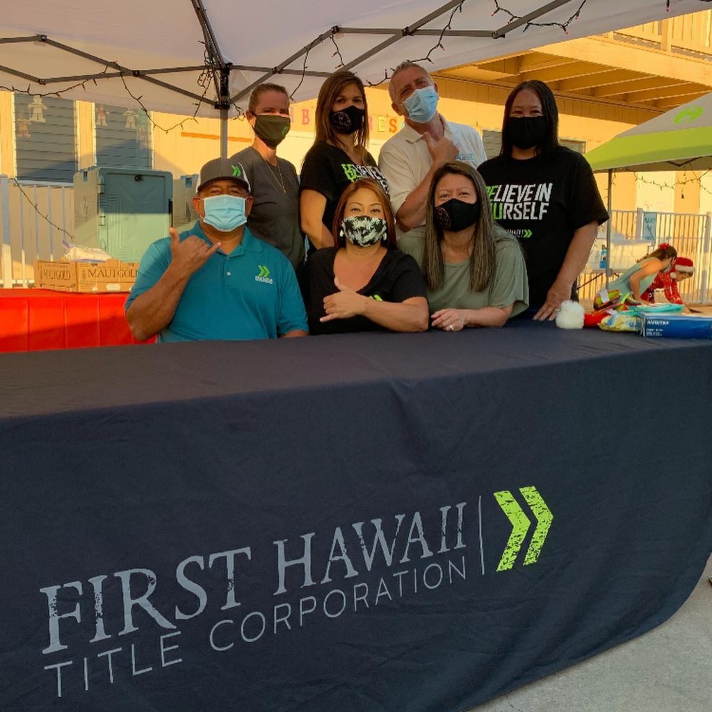 RAM members (seated, from left) Kai Schmidt, Jerrie Shannon and Rena Day and (standing, from left) Michele Andrion, Debra Cabradilla, Friends of the Children’s Justice Center of Maui Executive Director Paul Tonnessen and Shannon Cortez are all smiles at a drive-thu holiday event for deserving kids last month.