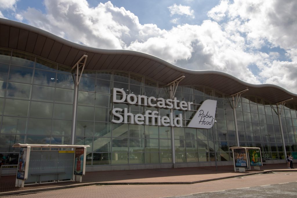 Doncaster UK, 18th August 2019:  The Doncaster Sheffield Robin Hood international airport, outside the front entrance taken on a part cloudy sunny day. in West Yorkshire