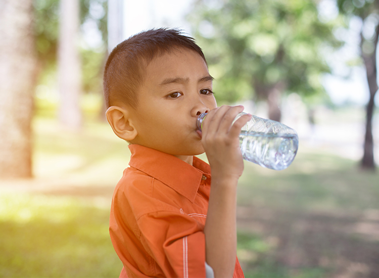 Boy drinking water