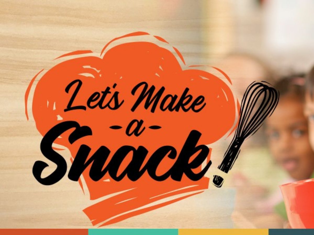 This image has a blurred background of a classroom, and over the top is the logo for Let's Make a Snack!